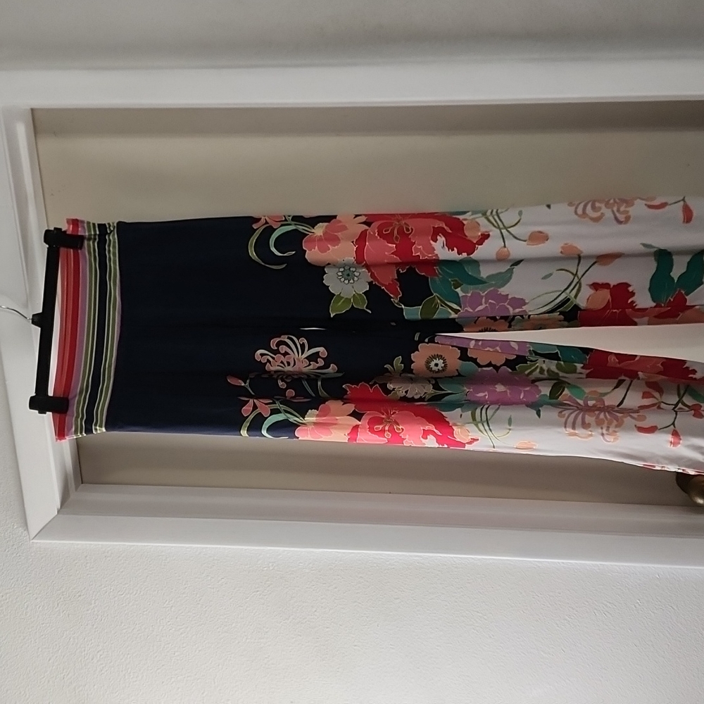 Tina Turk pants. Floral. Gold embellishments. Size medium